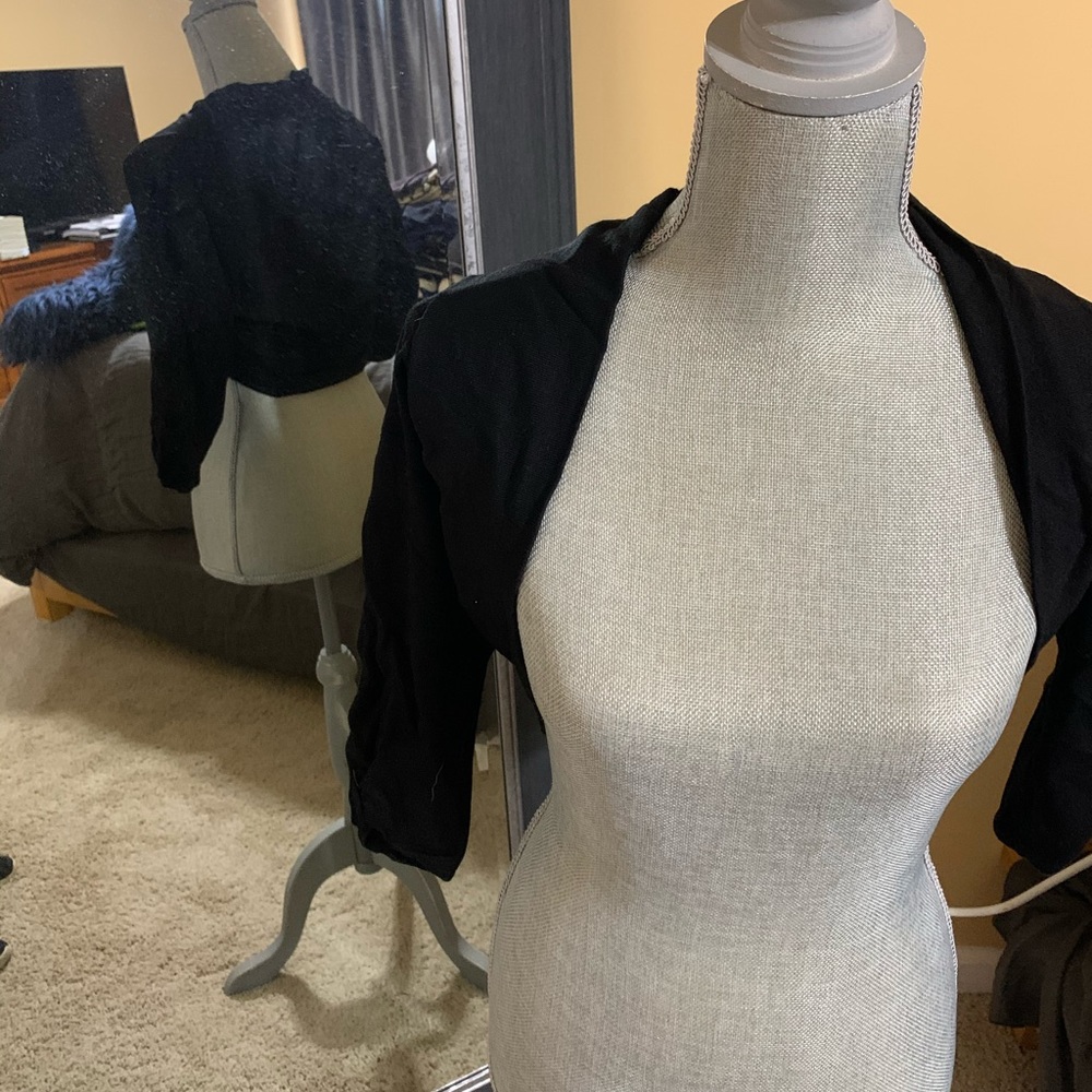 Shoulder cover sweater